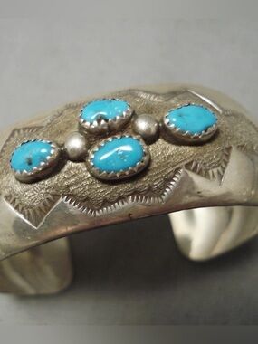 Vintage 1970’s Navajo Domed Turquoise and Sterling Sun Bracelet.